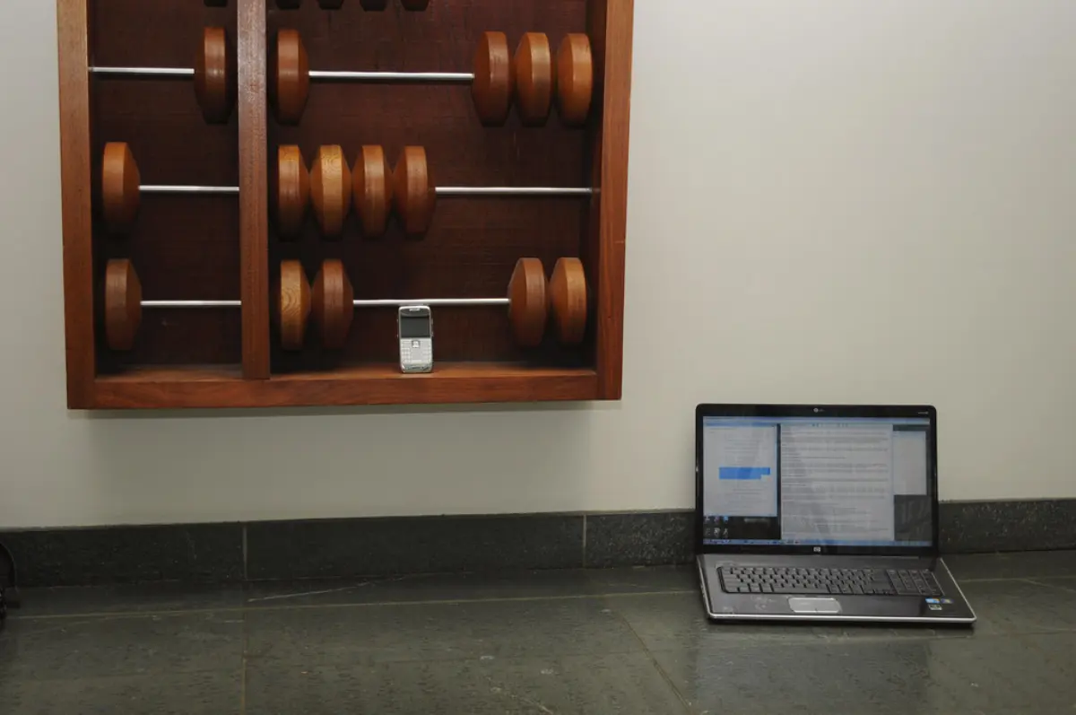 A laptop and smartphone on a desk